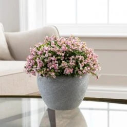 Artificial Pink Flowers In Grey Cement Plant Pot